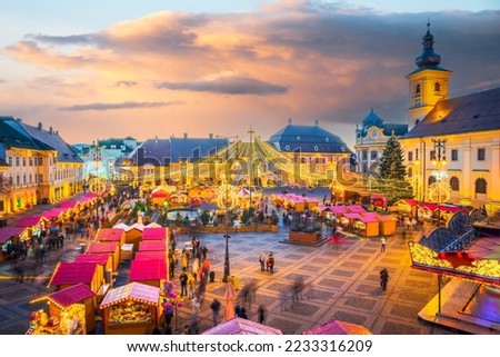 Sibiu, Romania. Night image with Christmas Market in Large Square, medieval downtown of Transylvania.