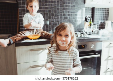 Siblings cooking holiday pie in the kitchen, casual still life photo series - Shutterstock ID 375178162