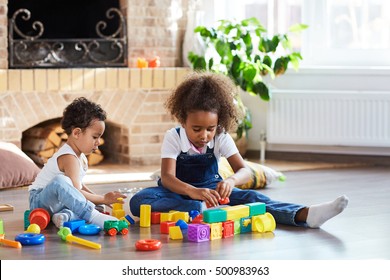 Siblings Playing