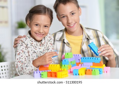 Siblings Playing Lego