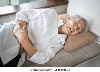 Sick Asian Senior Woman With Stomach Ache,old People Having Aching Belly,hands Touching Stomach Painful,gastritis,gastric Ulcer,severe Pain,chronic Abdominal Problems,colorectal Cancer,elderly Disease