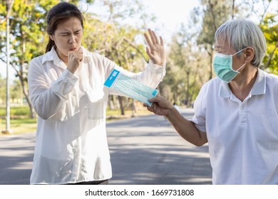 Sick Asian Woman With Coughing,refusing To Wear Face Mask,spread Of Contagious Diseases,Coronavirus Or Covid-19,confine,quarantine Yourself In The Accommodation,prevent Others From Becoming Infected