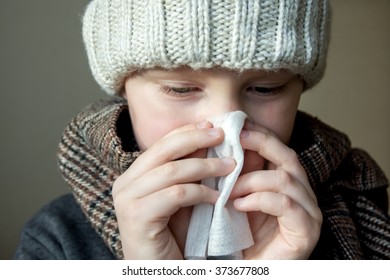 Sick Boy (child, Kid, Teen) Blowing His Nose 