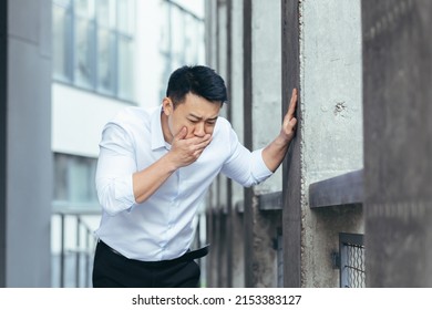 Sick Businessman, Asian Man Has Severe Nausea Outside Near The Office