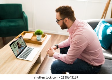 Sick Caucasian Man At Home Having A Video Call With His Doctor About A New Medical Treatment