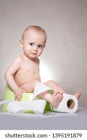 Sick Child Constipation, Colic Bloating, Indigestion Heartburn, Digestion, Pain, Diarrhea. Sitting On The Potty With Toilet Paper Rolls.