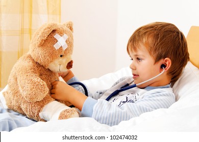 A Sick Child Examined Teddy With Stethoscope