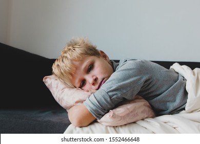 Sick Child With Fever At Home, Kid With Headache, Pain Concept