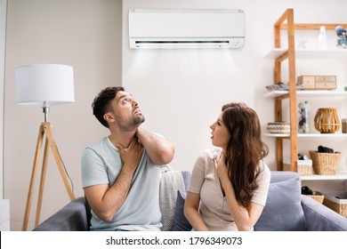 Sick Couple Having Cold And Sore Throat From Air Conditioner