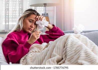 Sick Day At Home. Blonde Woman Has Coronavirus Or Common Cold. Cough. Closeup Of Beautiful Young Woman Caught Cold Or Flu Illness. Portrait Of Unhealthy Girl Feeling Pain In Throat.