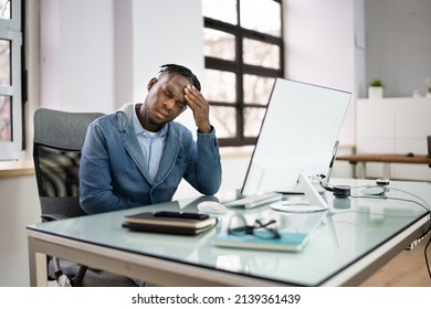 Sick Employee With Head Ache And Hangover - Shutterstock ID 2139361439