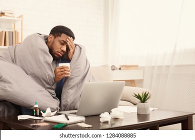 Sick Employee Suffering From Virus But Need To Work, Taking Pills For Flu And Using Laptop At Home, Copy Space