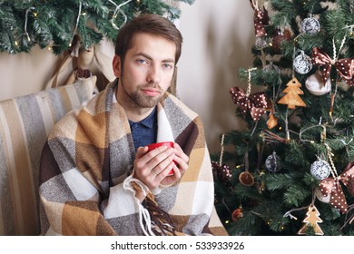 Sick Guy Isolated Has Runny Nose. Man Makes A Cure For The Common Cold. Winter Concept - Christmas Holiday. The Disease Is Not Just Warm Blanket