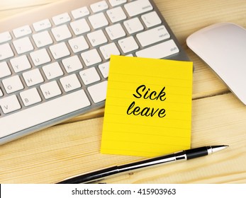 Sick Leave On Sticky Note On Work Table