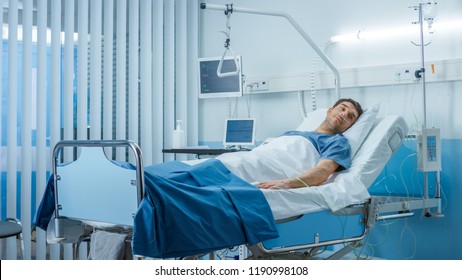 Sick Male Patient Lying On A Bed In The Private Ward In Hospital. White, Clean Environment.