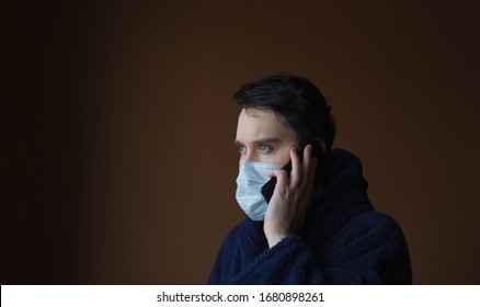 Sick Man Calling Coronavirus Or Covid 19 Hotline. Doctor's Consultation On The Phone. Feeling Ill At Home. Shot With Copyspace