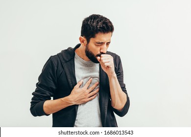 Sick man coughing over his hand. Coronavirus, covid-19 concept
