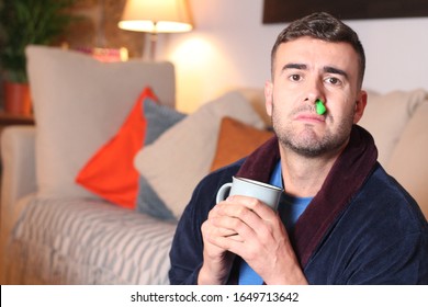 Sick Man With Green Mucus Running Down His Nose