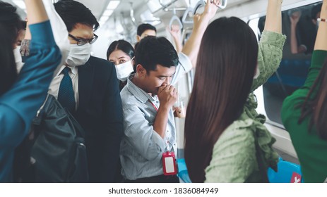 Sick man on train cough and make other people feel worry about virus spreading . Coronavirus COVID 19 pandemic and public transportation trouble concept . - Powered by Shutterstock