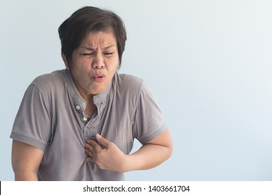 Sick Old Senior Woman Suffering From GERD Or Acid Reflux