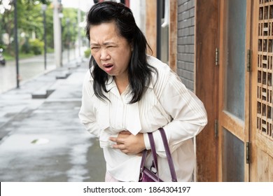 Sick Old Senior Woman Suffering From Stomachache, Diarrhea, Constipation, Food Poisoning, Stomach Cancer