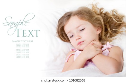 Sick Or Sad Child Preschool Age In Bed On White Background