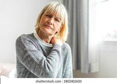 Sick Senior Adult Elderly Women Touching The Neck Have Shoulder And Neck Pain.Healthcare And Medicine Concept