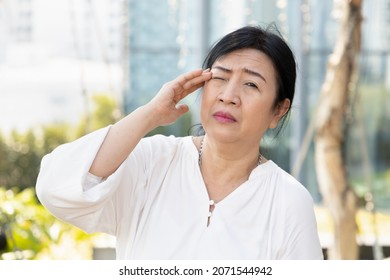 Sick Senior Woman Suffering From Dry Eye, Eye Irritation Or Inflammation