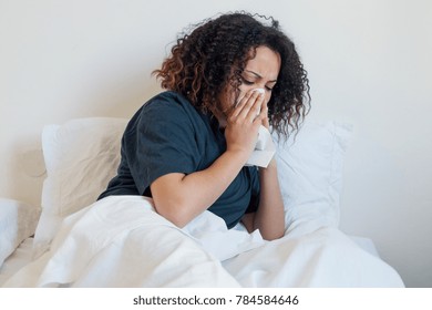 Sick And Tired Black Woman Lying In The Bed