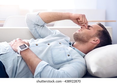 Sick Unhealthy Man Lying On The Couch