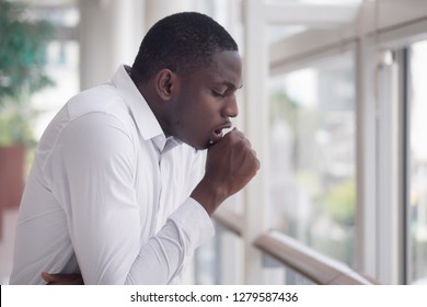 Sick Unvaccinated African Man Coughing, Portrait Of Ill Black Man Cough Due To Cold, Flu Virus Infection, Allergy, Polluted Air, Tuberculosis; Air Pollution, Virus, Lung Cancer, Emphysema Concept