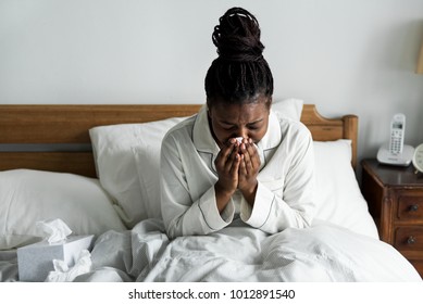 A Sick Woman In Bed