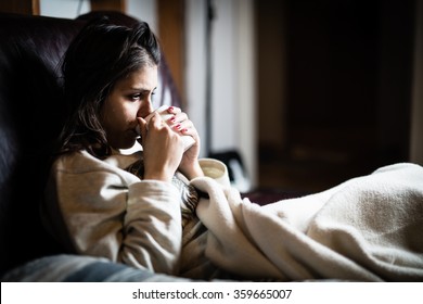 Sick Woman In Bed,calling In Sick,day Off From Work.Drinking Herbal Tea.Vitamins And Hot Tea For Flu.Woman Caught Cold.Virus. Dysentery.Diarrhea.Woman Looking Sick And Tired