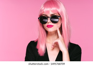 Sick Woman In A Black Coat And Sunglasses Bright Hair And Pink Lips