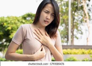 Sick Woman With Indigestion Problem, Acid Reflux Or GERD Symptoms