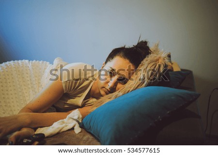 Similar – Baby sleeping on a blanket while her mother looks