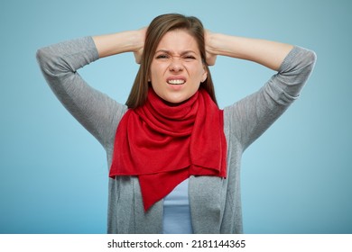 Sick Woman With Red Scarf With Headache And Some Virus Illness. Isolated Female Portrait On Light Blue Background.