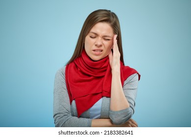 Sick Woman With Red Scarf With Headache And Some Virus Illness. Isolated Female Portrait With Closed Eyes On Light Blue Background.