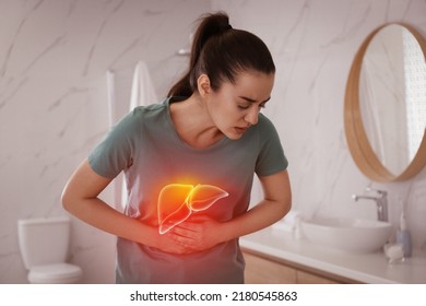 Sick woman suffering from pain in bathroom and illustration of unhealthy liver. Hepatitis disease