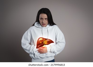 Sick Woman Suffering From Pain And Illustration Of Unhealthy Liver On Light Blue Background. Viral Hepatitis