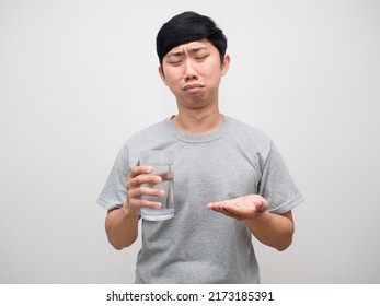 Sickness Man Feels Bored To Taking Medicine,Asian Man Holding Water Glass With Medicine