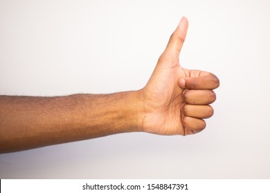 Side Angle Black Man Arm With Thumbs Up Hand Sign