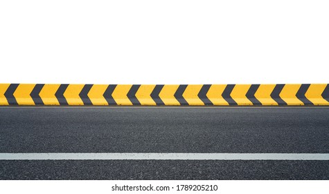Side angle view of asphalt racing track with yellow and black color arrow concrete railing