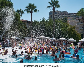 Side, Antalya / Turkey - July 24th 2019: People Having Fun At A Pool Party At The Barut Hemera Hotel In The Summer Of 2019 In Turkey.