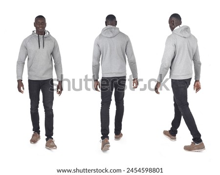 side, back and front view of same man walking on white background