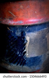 Side Of A Blue And Red Vintage Oil Barrel