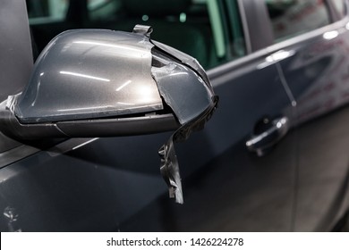 Side Car Brocken  Mirror Close-up. Details Of Gray Car 