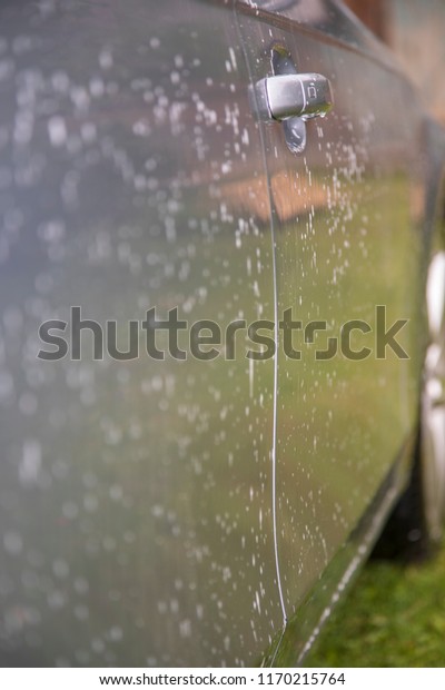 Side of the car\
which is washed in bubbles
