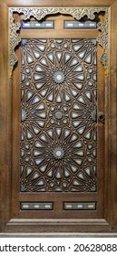 Side door of Minbar of historic public Mosque of Al Rifai, with wooden arabesque decorations tongue and groove assembled, inlaid with ivory and ebony, Old Cairo, Egypt - Shutterstock ID 2062808840