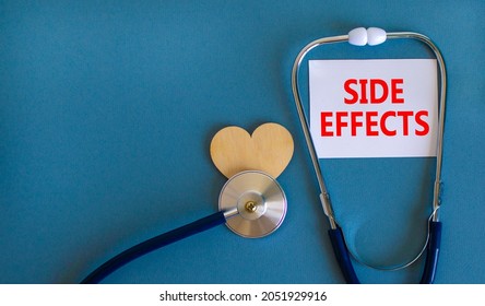 Side effects symbol. White card with words Side effects, beautiful blue background, wooden heart and stethoscope. Medical and side effects concept. - Shutterstock ID 2051929916